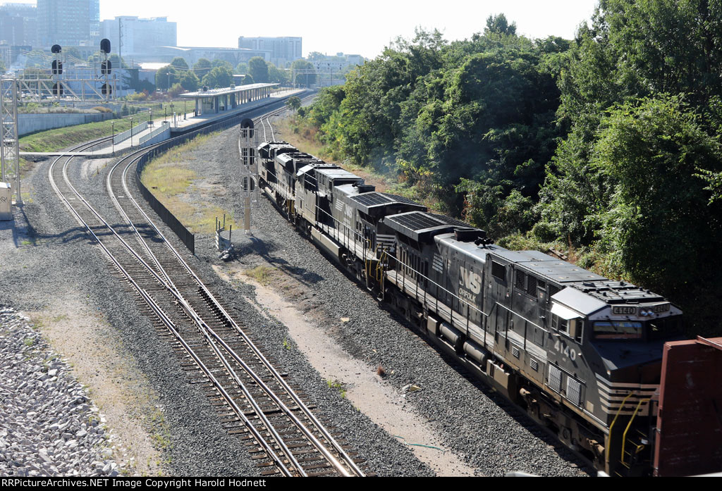 NS 4140 is the last of 3 locos on train 350, passing Raleigh Union Station